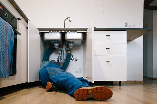 Professional Emergency Plumber technician working in Bellevue, MI